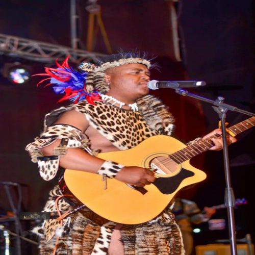 Inkos’yamagcokama performing at Durban theatre in Zulu regalia
